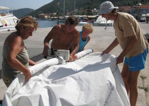 Sewing the damaged genoa